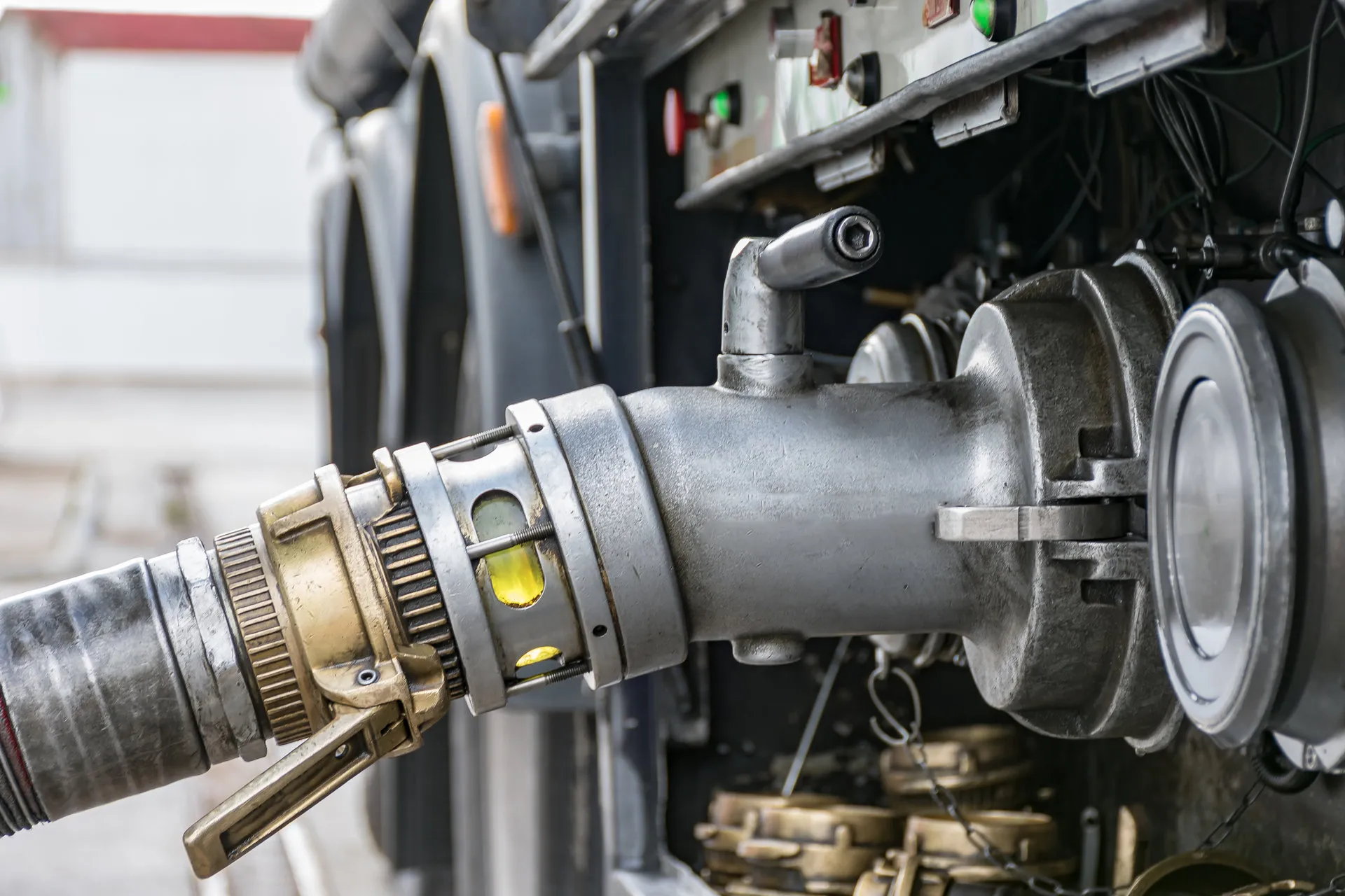 Close-up of a tanker coupling under inspection